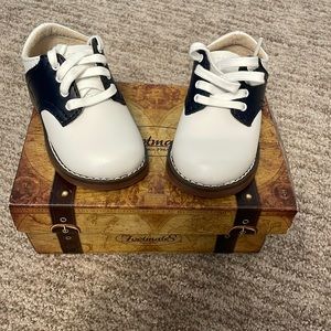 Blue and white baby walking shoes. Size 4